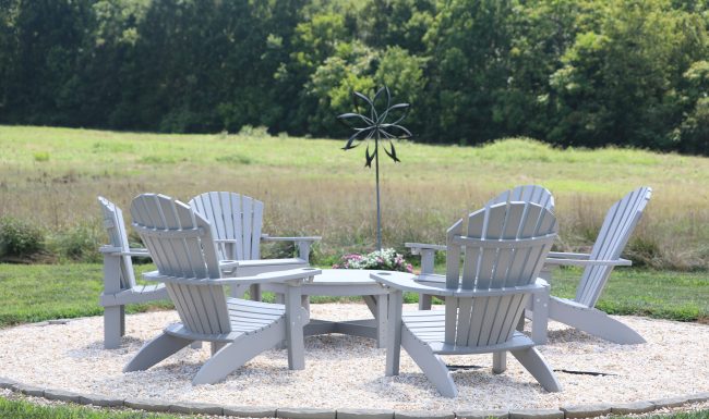 Adirondack chairs in a circle at the Copper Leaf tasting room